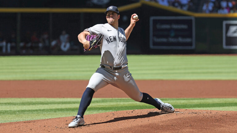 Carlos Rodon #55 of the New York Yankees throw s pitch in a game against the Arizona Diamondbacks at Chase Field.