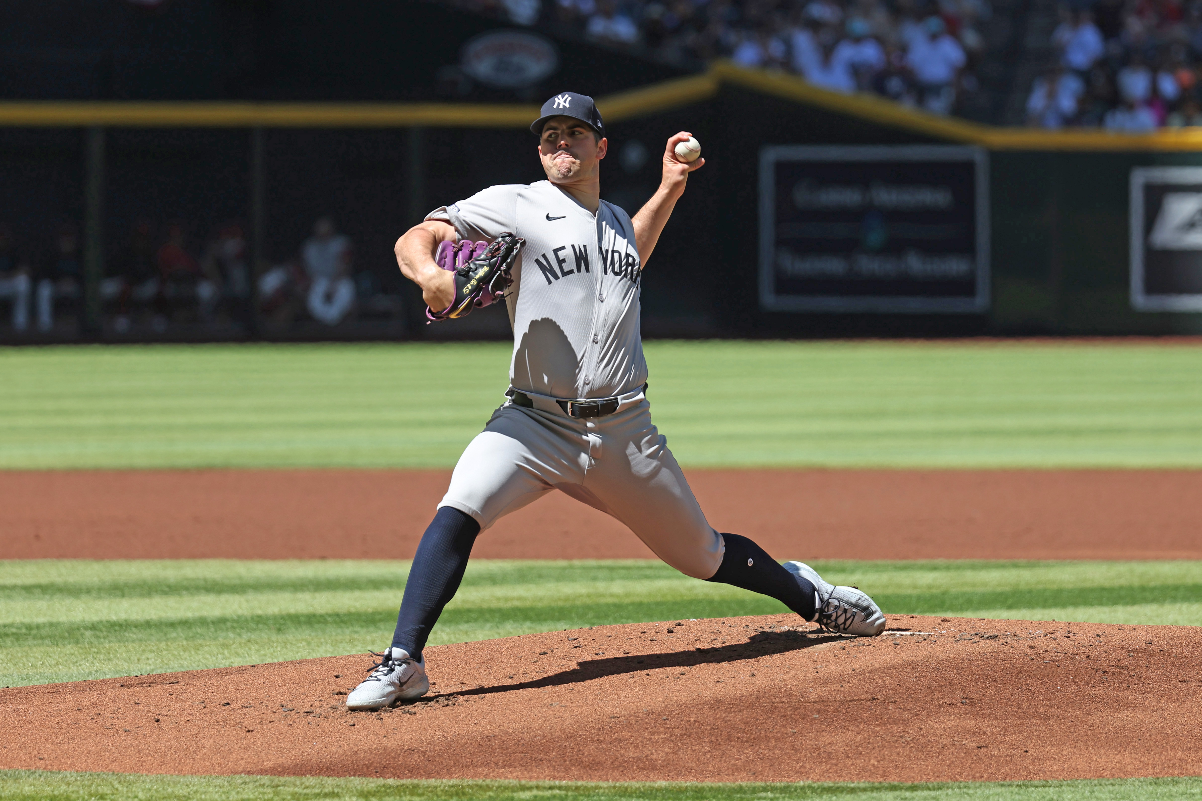 Carlos Rodon #55 of the New York Yankees throw s pitch in a game against the Arizona Diamondbacks at Chase Field.