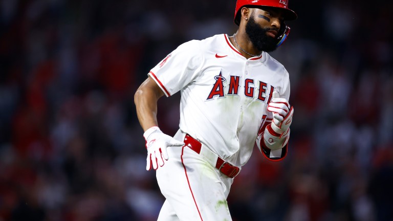 Jo Adell #7 of the Los Angeles Angels hits a home run against the Kansas City Royals in the fifth inning at Angel Stadium.