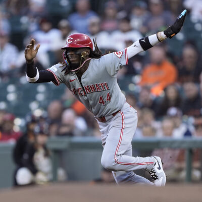 Elly De La Cruz of the Cincinnati Reds takes off from first base attempting to steal second against the San Francisco Giants in the top of the first inning at Oracle Park.