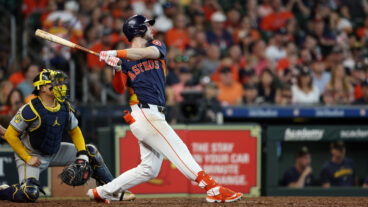 Kyle Tucker #30 of the Houston Astros hits a three run home run in the seventh inning against the Milwaukee Brewers at Minute Maid Park.