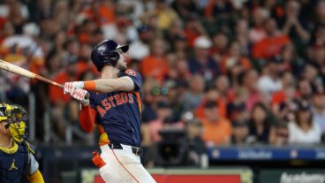 Kyle Tucker #30 of the Houston Astros hits a three run home run in the seventh inning against the Milwaukee Brewers at Minute Maid Park.