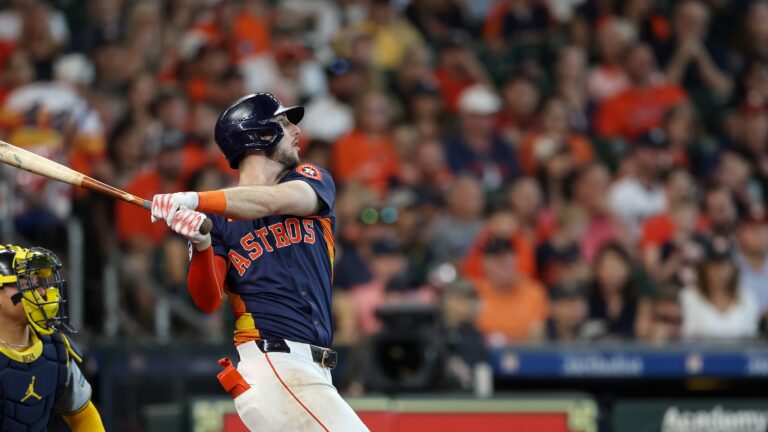 Kyle Tucker #30 of the Houston Astros hits a three run home run in the seventh inning against the Milwaukee Brewers at Minute Maid Park.