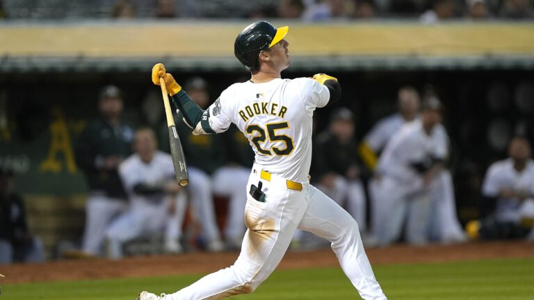 Brent Rooker of the Oakland Athletics bats against the Colorado Rockies in the bottom of the seventh inning at the Oakland Coliseum.