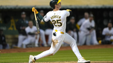 Brent Rooker of the Oakland Athletics bats against the Colorado Rockies in the bottom of the seventh inning at the Oakland Coliseum.