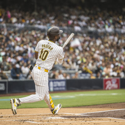 Jurickson Profar #10 of the San Diego Padres hits a home run in the first inning against the Miami Marlins at Petco Park.