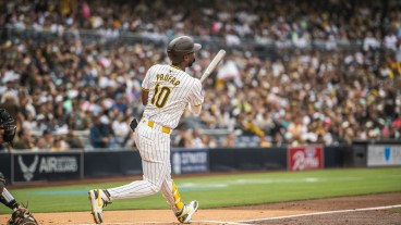 Jurickson Profar #10 of the San Diego Padres hits a home run in the first inning against the Miami Marlins at Petco Park.