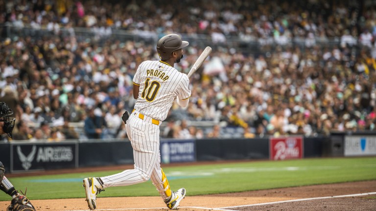 Jurickson Profar #10 of the San Diego Padres hits a home run in the first inning against the Miami Marlins at Petco Park.