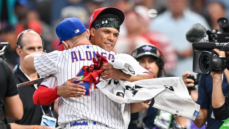 Pete Alonso of the New York Mets hugs Juan Soto of the Washington Nationals after Alonso advanced to the final round during the 2021 T-Mobile Home Run Derby at Coors Field. Both will be free agents during the 2024-25 MLB offseason.