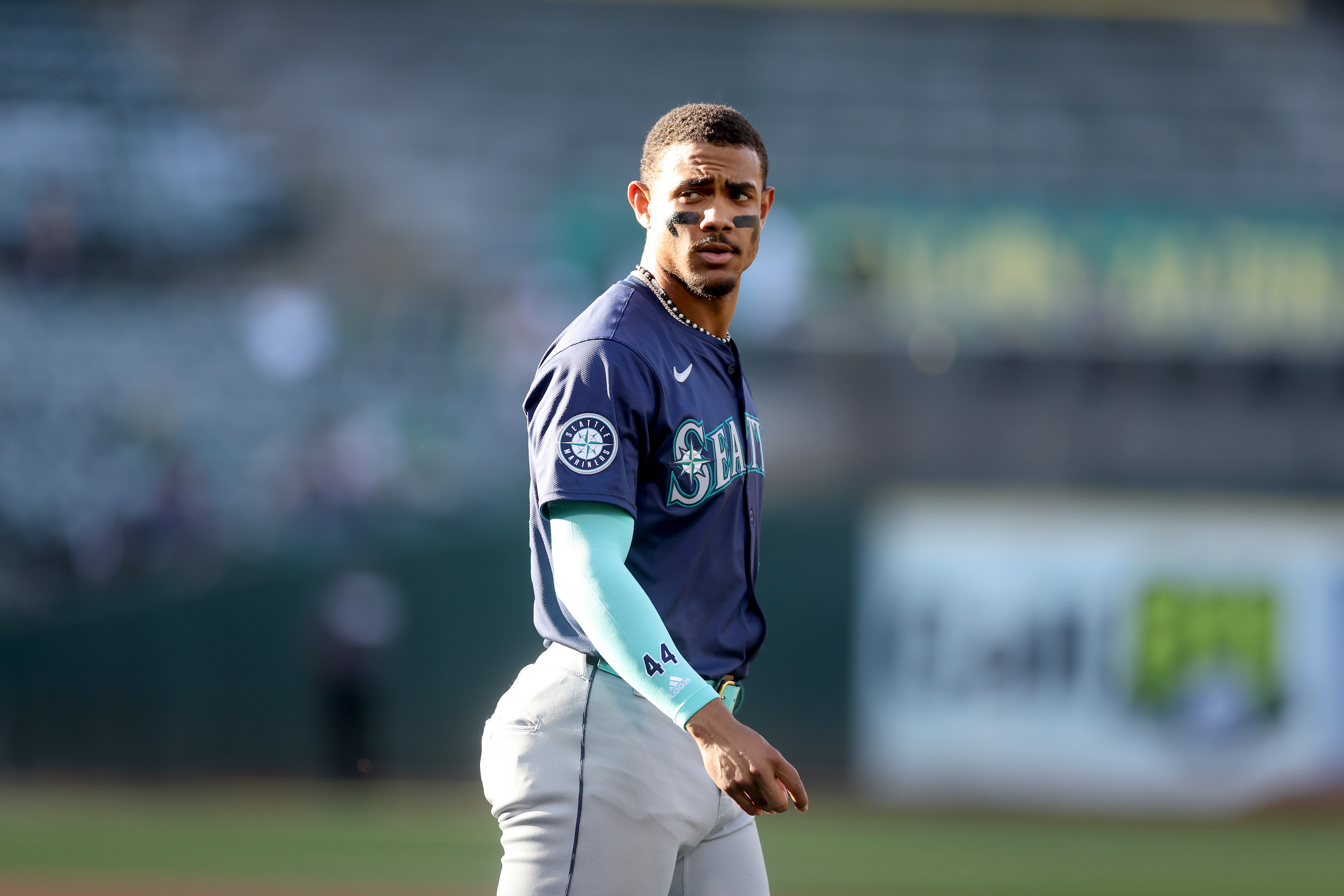 Julio Rodríguez of the Seattle Mariners walks to the dugout.