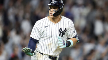 Aaron Judge #99 of the New York Yankees reacts after a solo home run against the Los Angeles Dodgers during the eighth inning at Yankee Stadium.