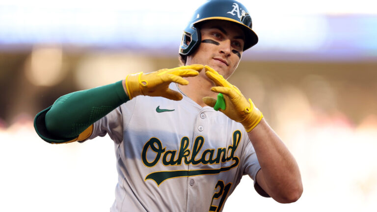 Tyler Soderstrom of the Oakland Athletics celebrates his two-run home run as he rounds the bases against the Minnesota Twins in the second inning at Target Field.