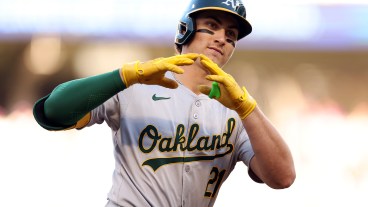 Tyler Soderstrom of the Oakland Athletics celebrates his two-run home run as he rounds the bases against the Minnesota Twins in the second inning at Target Field.