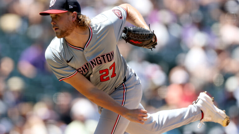 Starting pitcher Jake Irvin of the Washington Nationals throws against the Colorado Rockies in the first inning inning at Coors Field.