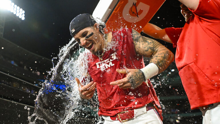 Jarren Duran #16 of the Boston Red Sox is doused with water after hitting the game winning RBI against the Toronto Blue Jays during the ninth inning at Fenway Park.