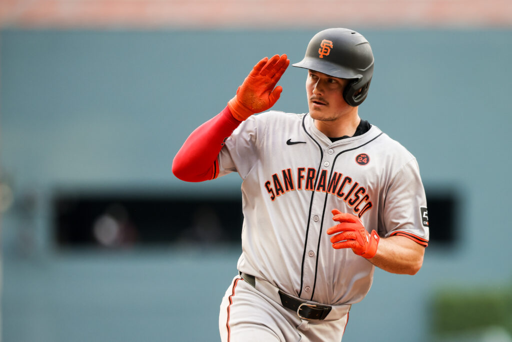 Matt Chapman #26 of the San Francisco Giants rounds the bases after hitting a go ahead solo home run during the fourth inning against the Atlanta Braves at Truist Park.
