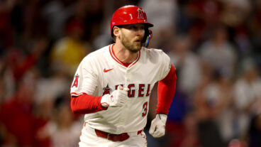 Taylor Ward of the Los Angeles Angels runs to first base after hitting a two RBI double during the seventh inning against the Detroit Tigers at Angel Stadium.