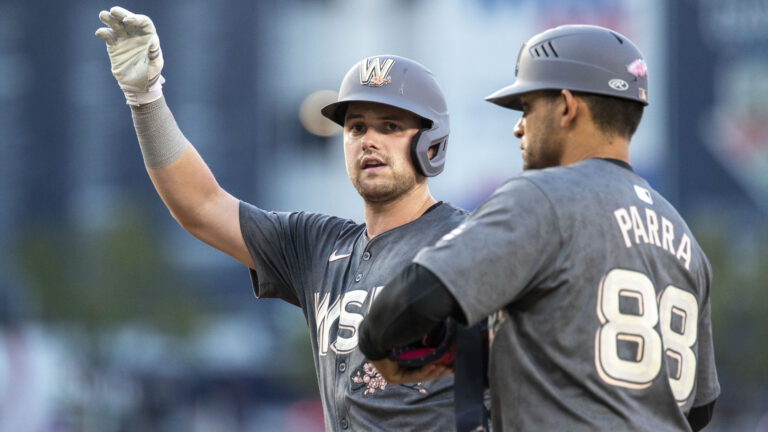 Washington Nationals outfielder Lane Thomas celebrates after hitting a single during the St. Louis Cardinals versus Washington Nationals MLB game at Nationals Park.
