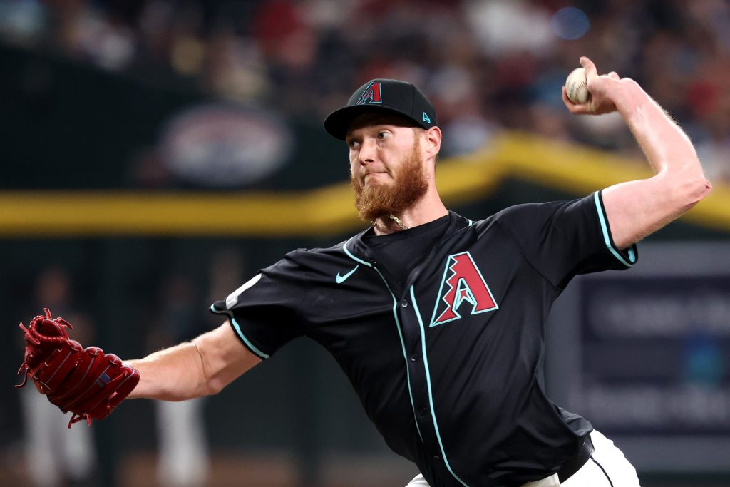 PHOENIX, ARIZONA - JULY 27: Relief pitcher A.J. Puk #33 of the Arizona Diamondbacks throws against the Pittsburgh Pirates during the eighth inning at Chase Field on July 27, 2024 in Phoenix, Arizona. (Photo by Chris Coduto/Getty Images)
