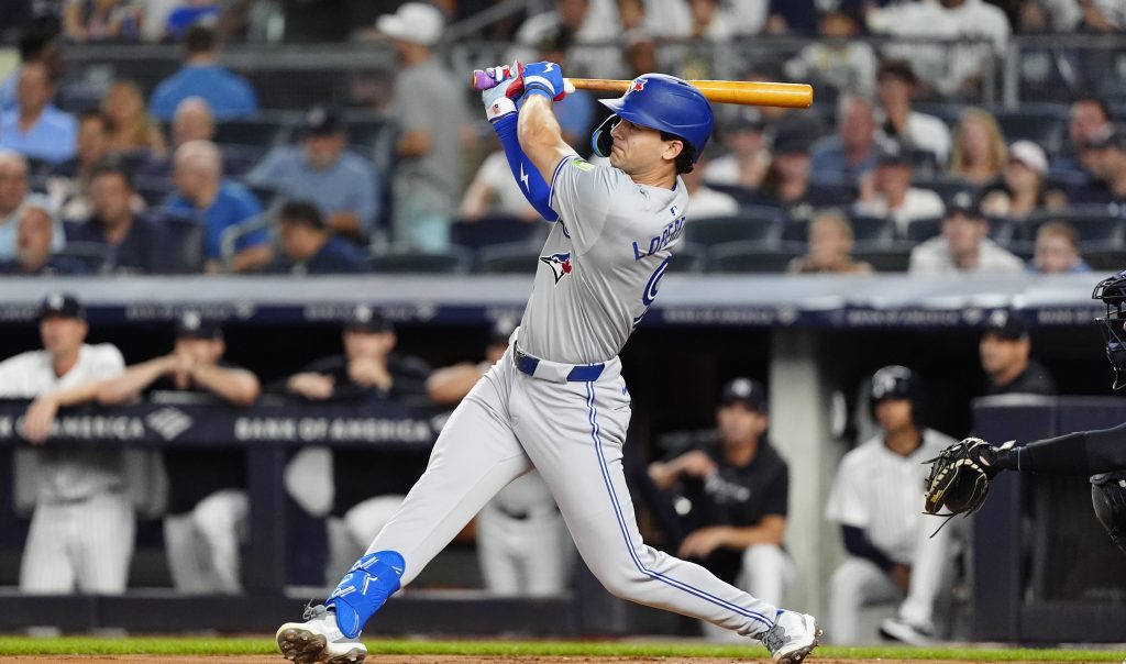 Toronto Blue Jays Left Fielder Joey Loperfido (9) hits a triple during the first inning of the Major League Baseball game between the Toronto Blue Jays and New York Yankees at Yankee Stadium.
