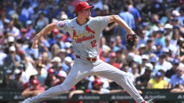 Erick Fedde #12 of the St. Louis Cardinals throws a pitch during the third inning of a game against the Chicago Cubs at Wrigley Field.