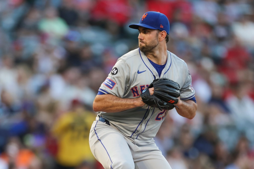 David Peterson #23 of the New York Mets pitches in the second inning during a game against the Los Angeles Angels at Angel Stadium of Anaheim.