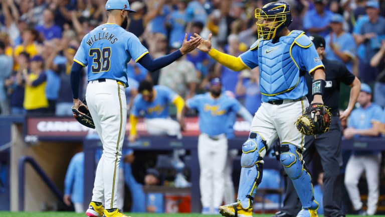 MILWAUKEE, WI - AUGUST 17: Milwaukee Brewers pitcher Devin Williams (38) celebrates his save with Milwaukee Brewers catcher Gary Sánchez (99) during a game between the Milwaukee Brewers and the Cleveland Guardians on August 17, 2024 at American Family Field in Milwaukee, WI. (Photo by Larry Radloff/Icon Sportswire via Getty Images)