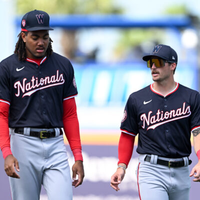 PORT ST. LUCIE, FLORIDA - MARCH 15, 2024: Dylan Crews #3 and James Wood #50 of the Washington Nationals warm up prior to a spring training Spring Breakout game against the New York Mets at Clover Park on March 15, 2024 in Port St. Lucie, Florida. (Photo by Nick Cammett/Diamond Images via Getty Images)