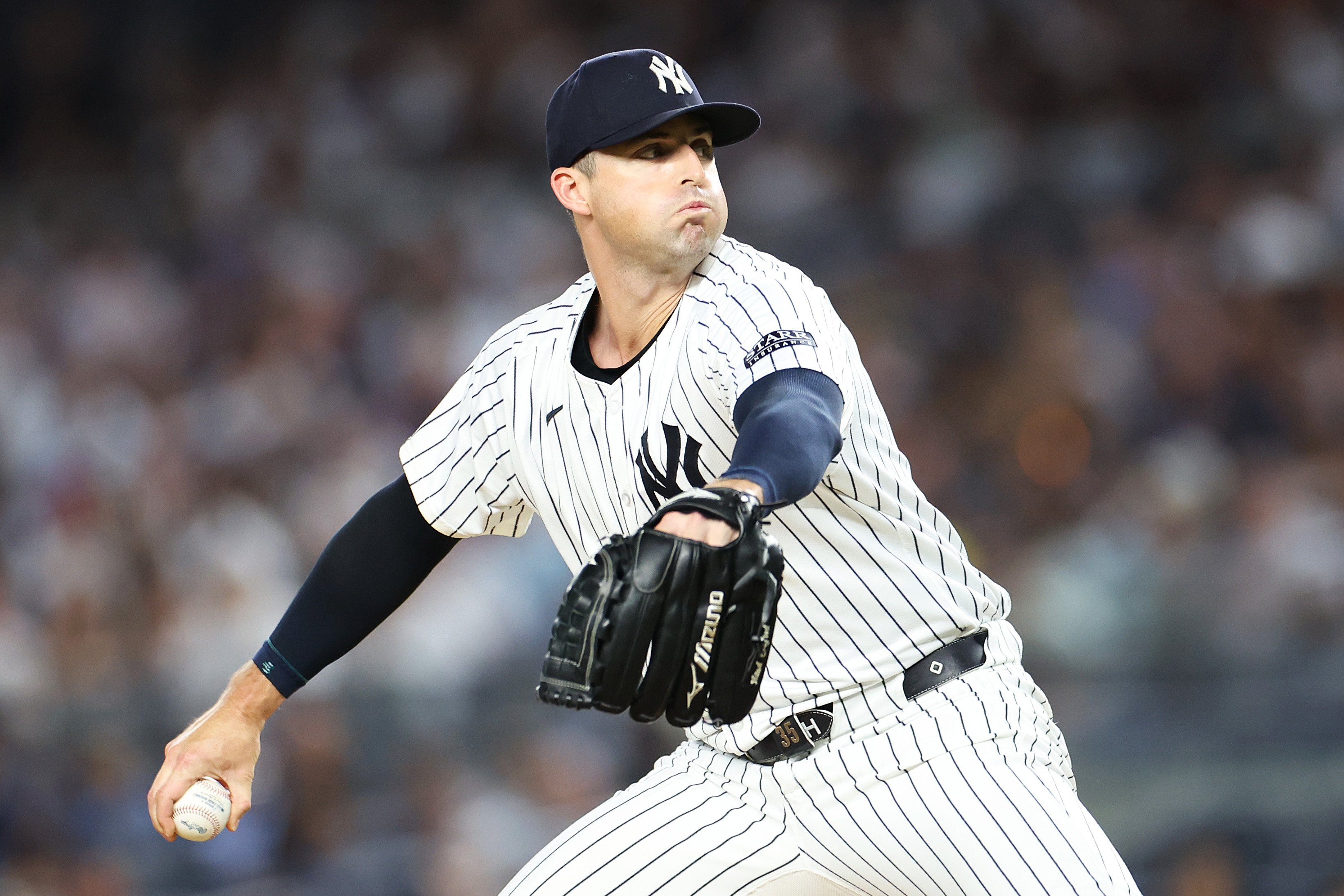 Clay Holmes #35 of the New York Yankees in action against the Cincinnati Reds at Yankee Stadium.