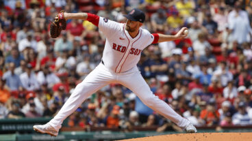 BOSTON, MA - AUGUST 11: James Paxton #65 of the Boston Red Sox pitches against the Houston Astros during the first inning at Fenway Park on August 11, 2024 in Boston, Massachusetts. (Photo By Winslow Townson/Getty Images)