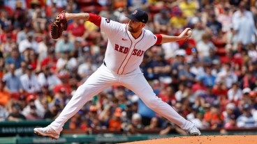 BOSTON, MA - AUGUST 11: James Paxton #65 of the Boston Red Sox pitches against the Houston Astros during the first inning at Fenway Park on August 11, 2024 in Boston, Massachusetts. (Photo By Winslow Townson/Getty Images)
