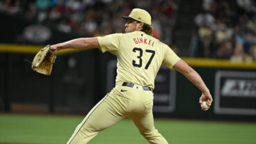 PHOENIX, ARIZONA - AUGUST 13: Kevin Ginkel #37 of the Arizona Diamondbacks delivers a pitch against the Colorado Rockies at Chase Field on August 13, 2024 in Phoenix, Arizona. (Photo by Norm Hall/Getty Images)