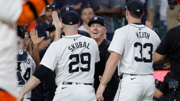 DETROIT, MI - AUGUST 31: Manager A.J. Hinch #14 of the Detroit Tigers smiles at starting pitcher Tarik Skubal #29 and Colt Keith #33 after a win over the Boston Red Sox at Comerica Park on August 31, 2024 in Detroit, Michigan. (Photo by Duane Burleson/Getty Images)