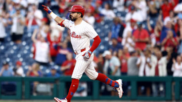 Kyle Schwarber of the Philadelphia Phillies rounds bases after hitting a solo home run during the first inning against the Tampa Bay Rays at Citizens Bank Park.