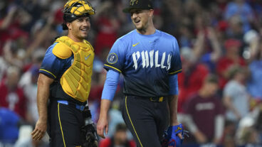 J.T. Realmuto and Jeff Hoffman of the Philadelphia Phillies react after the game against the Washington Nationals at Citizens Bank Park.
