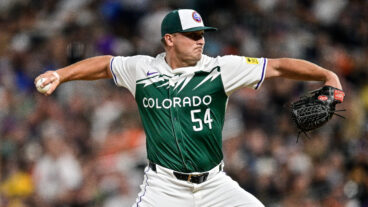 Seth Halvorsen of the Colorado Rockies pitches in the seventh inning against the Baltimore Orioles at Coors Field.