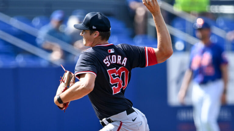 Travis Sykora of the Washington Nationals throws a pitch during the third inning of a spring training Spring Breakout game against the New York Mets at Clover Park.
