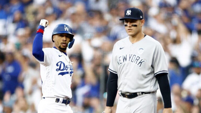 Mookie Betts #50 of the Los Angeles Dodgers after a single against the New York Yankees in the first inning at Dodger Stadium.