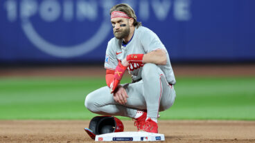 Bryce Harper of the Philadelphia Phillies looks on from second base in the sixth inning against the New York Mets during Game Four of the Division Series at Citi Field.