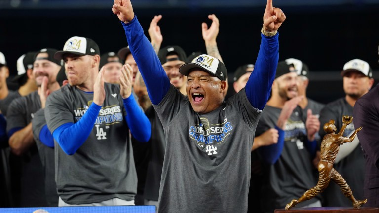 Manager Dave Roberts #30 of the Los Angeles Dodgers celebrates after the Dodgers defeated the New York Yankees in Game 5 to clinch the 2024 World Series presented by Capital One at Yankee Stadium.