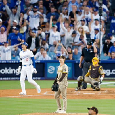 Dylan Cease #84 of the San Diego Padres watches a three-run home run by Shohei Ohtani #17 of the Los Angeles Dodgers during the second inning game one of the National League Division Series at Dodger Stadium.
