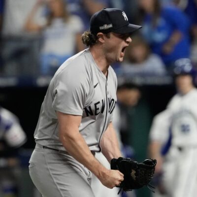 Gerrit Cole of the New York Yankees reacts during the seventh inning against the Kansas City Royals during Game Four of the Division Series at Kauffman Stadium.