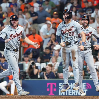HOUSTON, TX - OCTOBER 02: (left to right) Detroit Tigers second baseman Colt Keith (33), Detroit Tigers first baseman Spencer Torkelson (20) and Detroit Tigers right fielder Matt Vierling (8) cheer on Detroit Tigers third baseman Andy Ibáñez (77) (not pictured), cheer he gets on third base in the top of the eighth inning during the 2024 AL Wild Card Game between the Detroit Tigers and Houston Astros on October 2, 2024 at Minute Maid Park in Houston, Texas. (Photo by Leslie Plaza Johnson/Icon Sportswire via Getty Images)