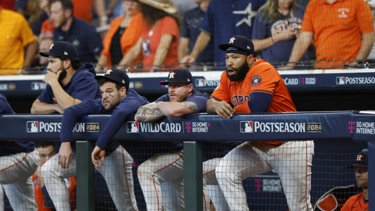 HOUSTON, TEXAS - OCTOBER 02: Jon Singleton #28 of the Houston Astros (R) reacts after losing to the Detroit Tigers 5-2 during Game Two of the Wild Card Series at Minute Maid Park on October 02, 2024 in Houston, Texas. (Photo by Tim Warner/Getty Images)