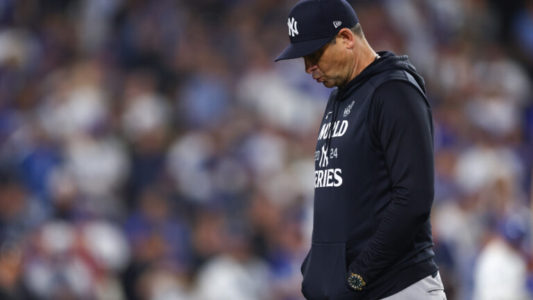 LOS ANGELES, CALIFORNIA - OCTOBER 25: Aaron Boone #17 of the New York Yankees walks to the mound in the seventh inning against the Los Angeles Dodgers during Game One of the 2024 World Series at Dodger Stadium on October 25, 2024 in Los Angeles, California. (Photo by Maddie Meyer/Getty Images)