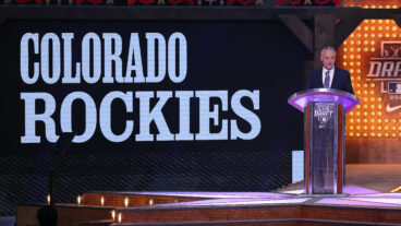 Major League Baseball commissioner Robert D. Manfred Jr. announces the pick for the Colorado Rockies at the 2024 MLB Draft at Cowtown Coliseum.