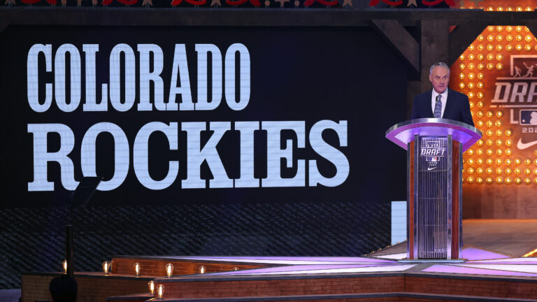 Major League Baseball commissioner Robert D. Manfred Jr. announces the pick for the Colorado Rockies at the 2024 MLB Draft at Cowtown Coliseum.
