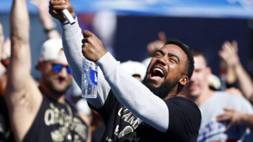 Free agent Teoscar Hernandez (then of the Los Angeles Dodgers) celebrates during the 2024 World Series Celebration Show at Dodger Stadium.