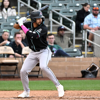 Jordan Lawlar of the Arizona Diamondbacks bats during the fourth inning of a spring training Spring Breakout game against the Colorado Rockies at Salt River Fields at Talking Stick.