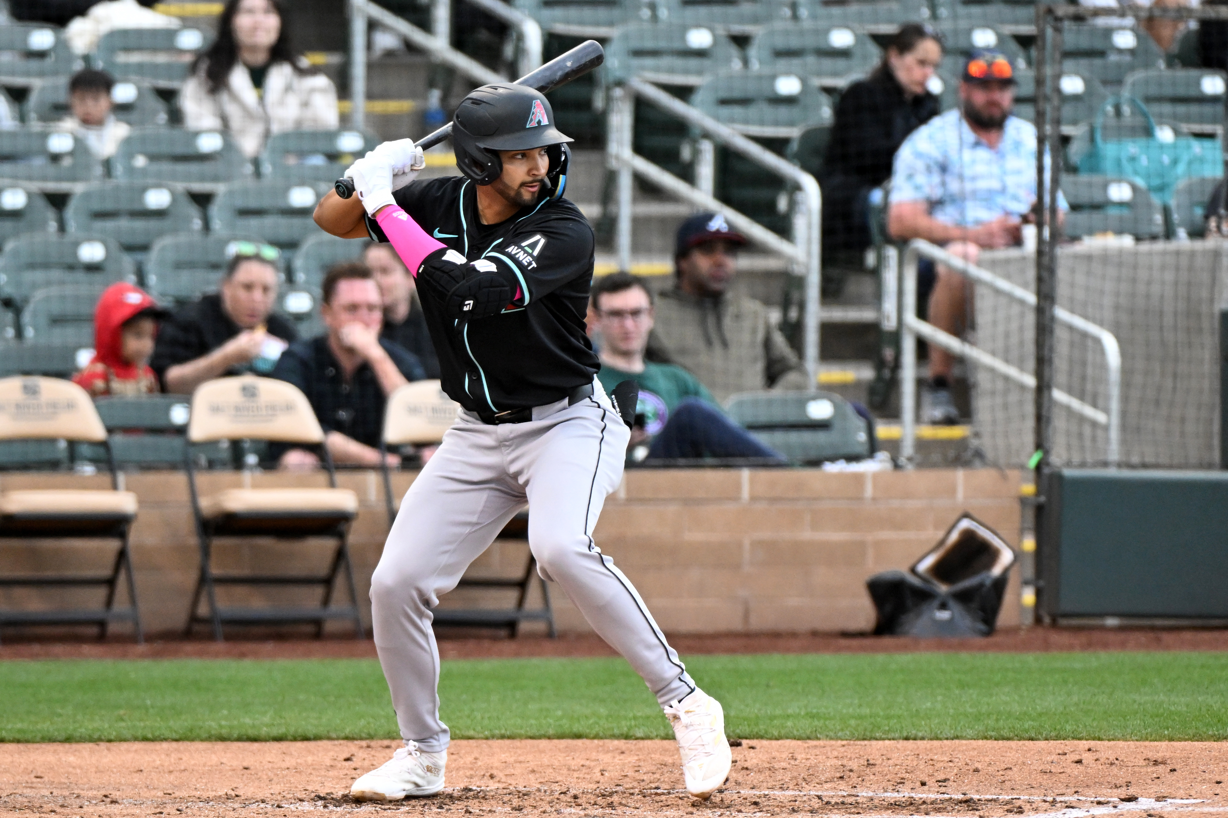 Jordan Lawlar of the Arizona Diamondbacks bats during the fourth inning of a spring training Spring Breakout game against the Colorado Rockies at Salt River Fields at Talking Stick.